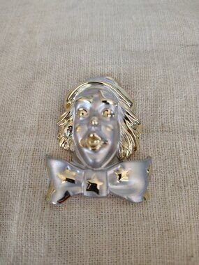Vintage two tone silver tone and gold tone pierrot clown face brooch